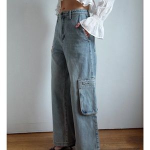 Light blue denim wide leg denim trousers with cargo zip side pockets